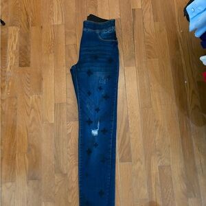 Stylish Blue Jeans with Black Accents‎